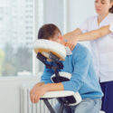 Massage On The Massage Chair In The Office.